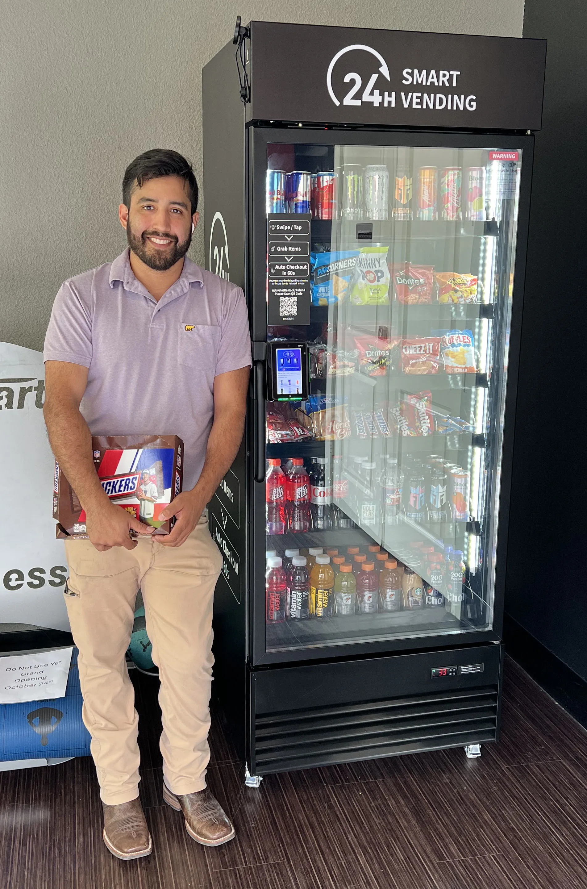 Anthony, owner of Snack-A-Tonio, with a smart vending machine